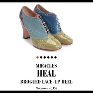 Brand new John Fluevog Brogued lace up heel